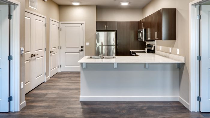 Sagebrush Apartments kitchen with stainless steel appliances