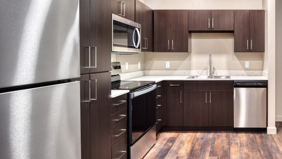 Kitchen with brown Cabinets